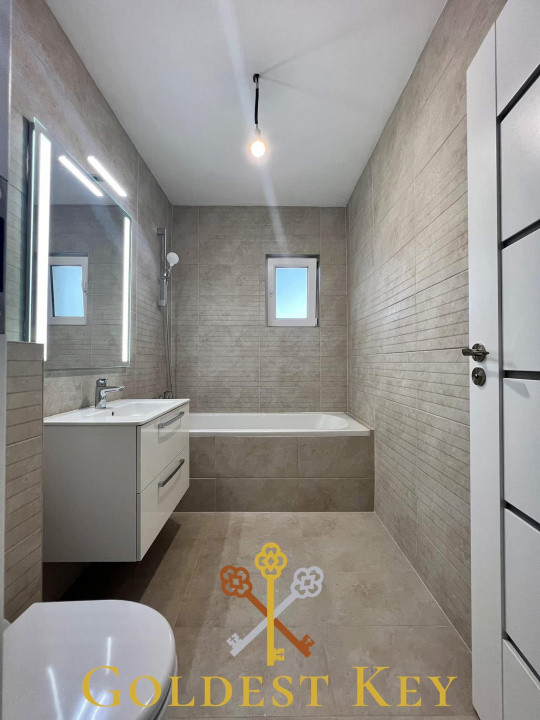 Apartament spațios cu 2 camere, terasă, etaj intermediar și parcare