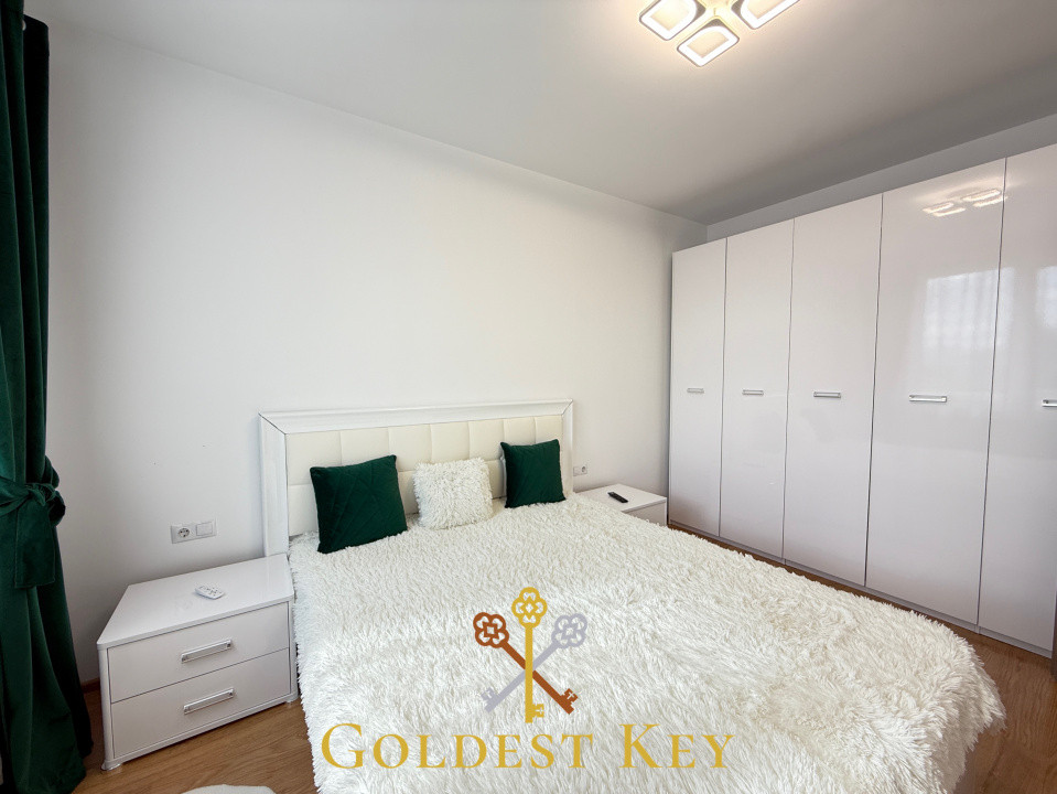 Apartament generos cu 2 camere, balcon și parcare exterioară 