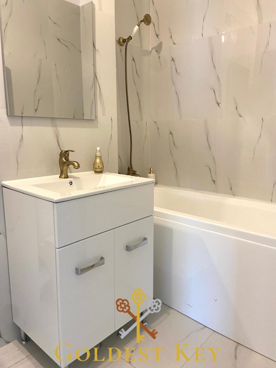 Apartament generos cu 2 camere, balcon și parcare subterană 