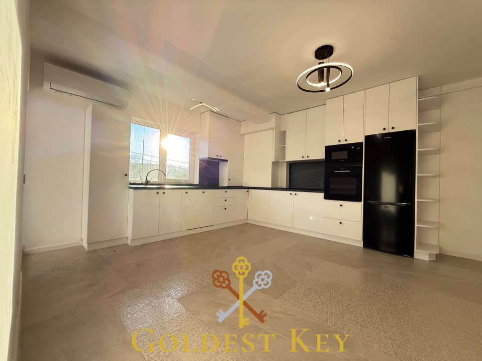 Apartament premium cu 3 camere, 2 băi, terasă și parcare subterană 