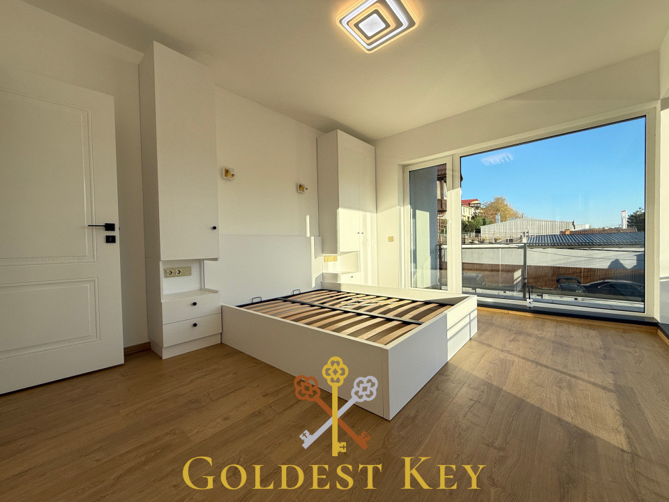 Apartament premium cu 3 camere, 2 băi, terasă și parcare subterană 