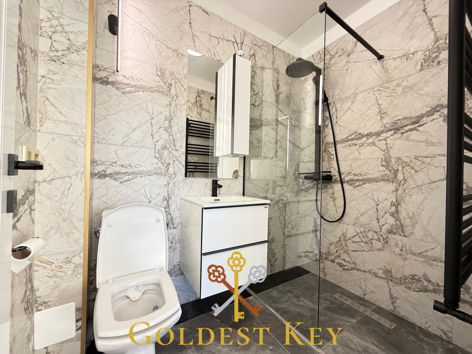 Apartament premium cu 3 camere, 2 băi, terasă și parcare subterană 