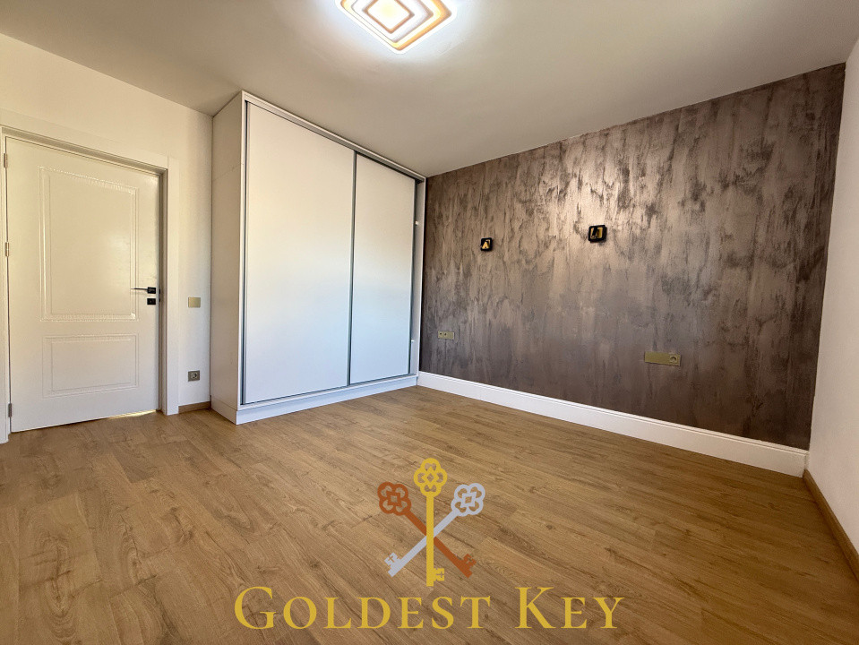 Apartament premium cu 3 camere, 2 băi, terasă și parcare subterană 