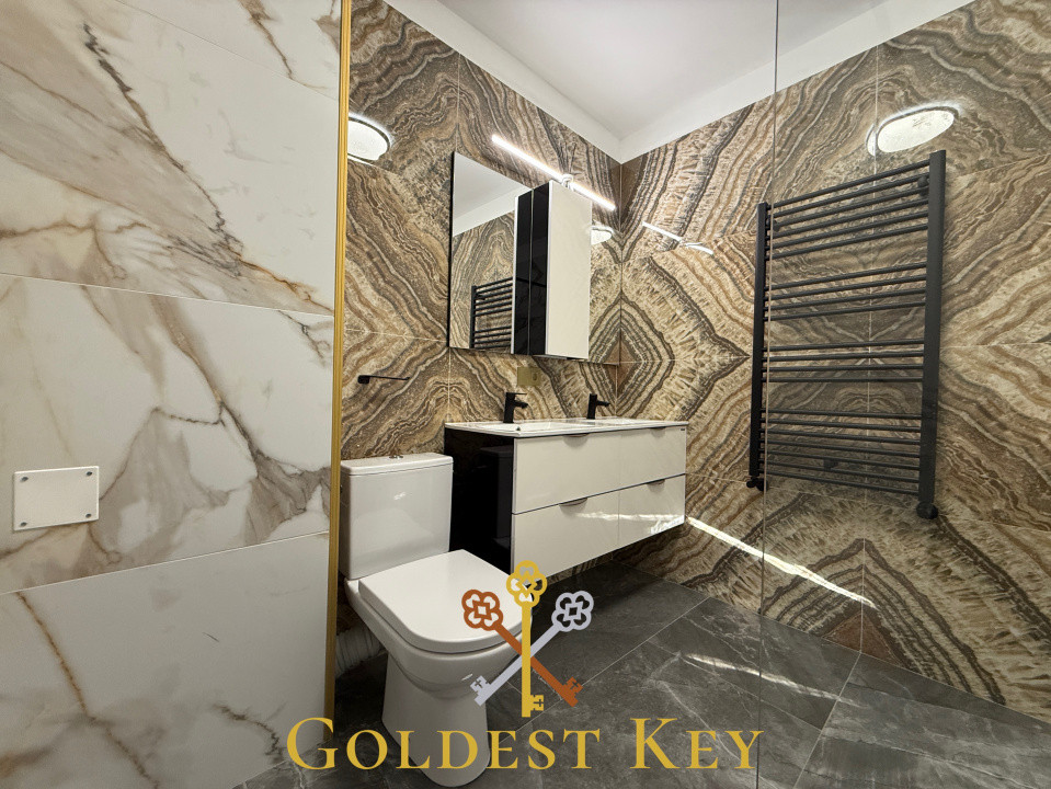 Apartament premium cu 3 camere, 2 băi, terasă și parcare subterană 