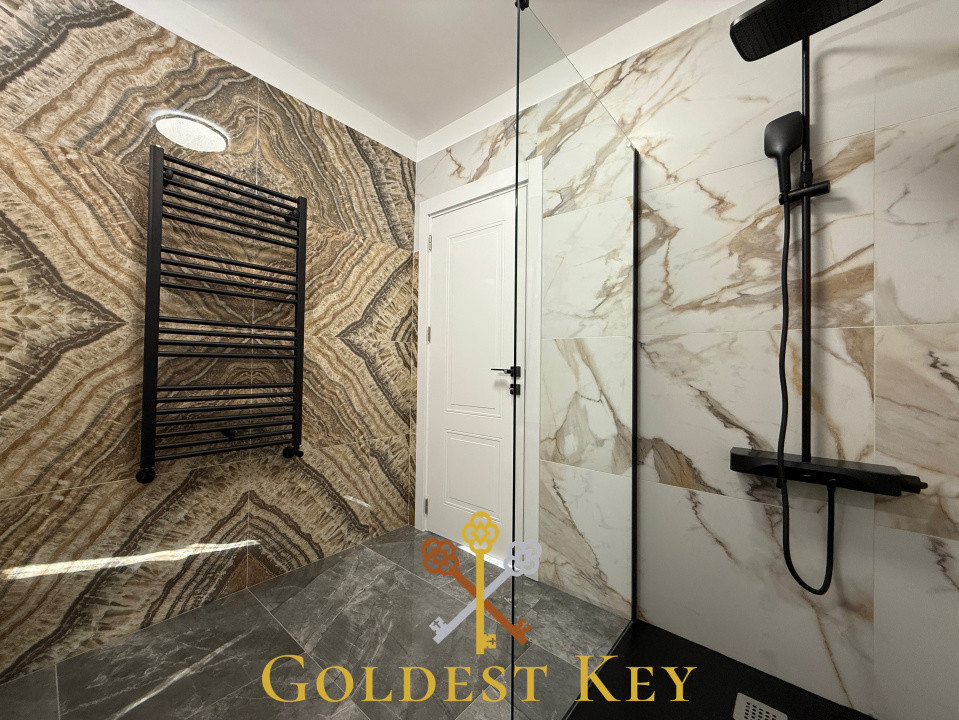 Apartament premium cu 3 camere, 2 băi, terasă și parcare subterană 