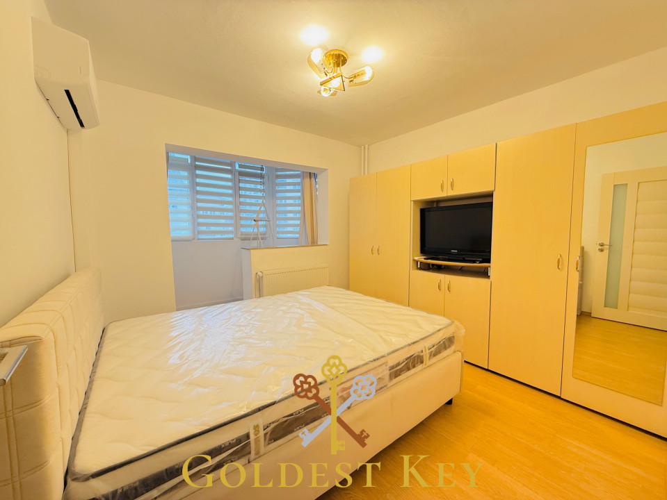 Apartament cu 2 camere decomandat, balcon închis și parcare 