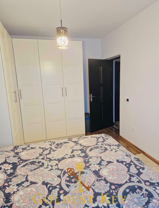 Apartament cu 3 camere, balcoane și curte privată cu parcare