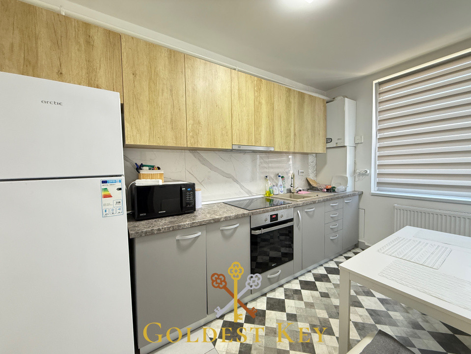 Apartament spațios cu 3 camere, 2 băi și garaj