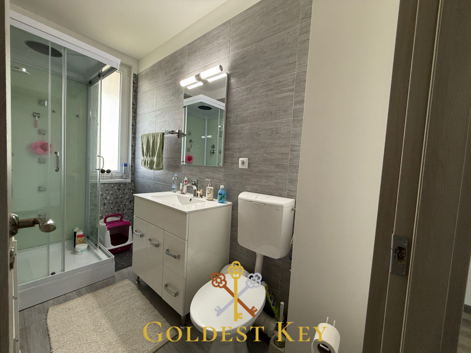 Apartament spațios cu 3 camere, 2 băi și garaj