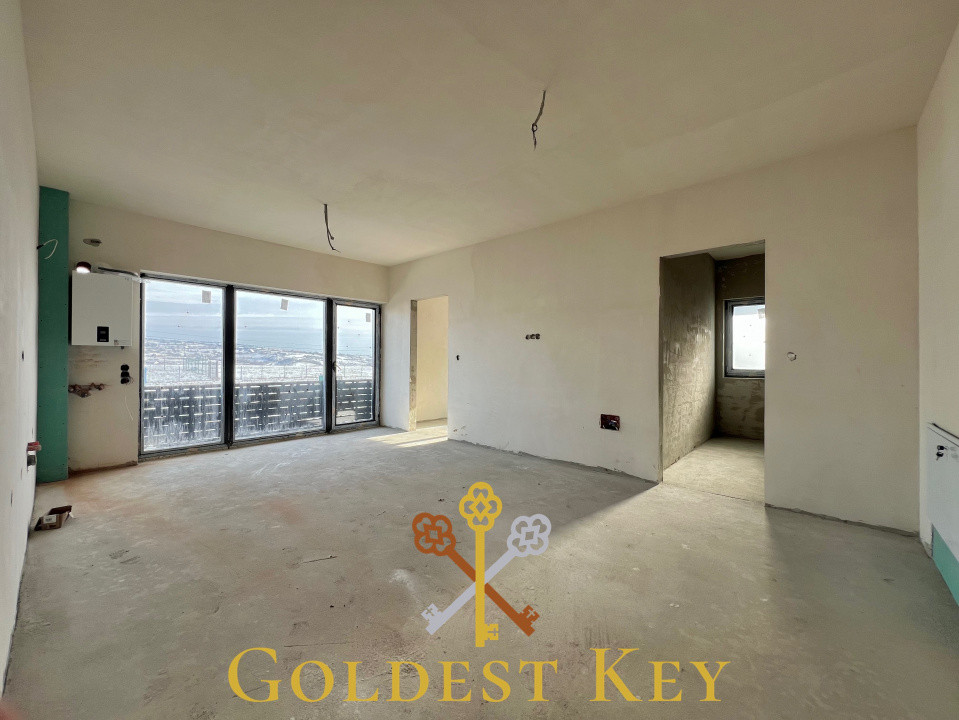 Apartament semifinisat cu 2 camere, balcon, parcare exterioară! Baciu