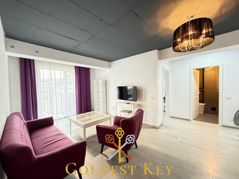 Apartament cu 2 camere, bucatarie separata și garaj subteran 