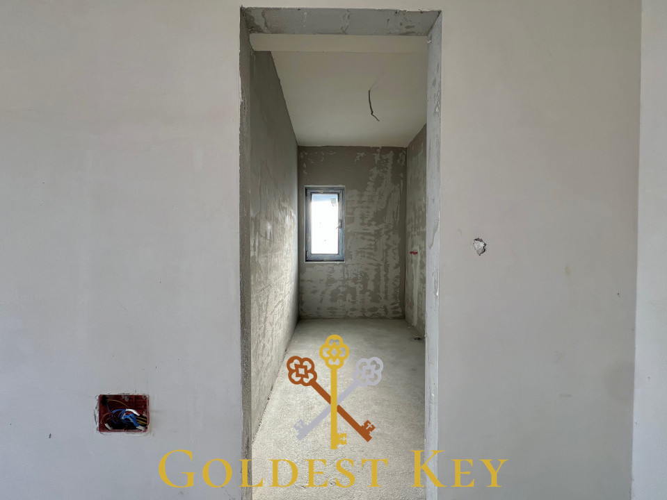 Apartament semifinisat cu 2 camere, balcon, parcare exterioară! Baciu