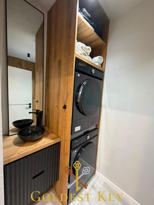 Apartament calitativ cu 3 camere, 2 băi, balcon, 2 garaje