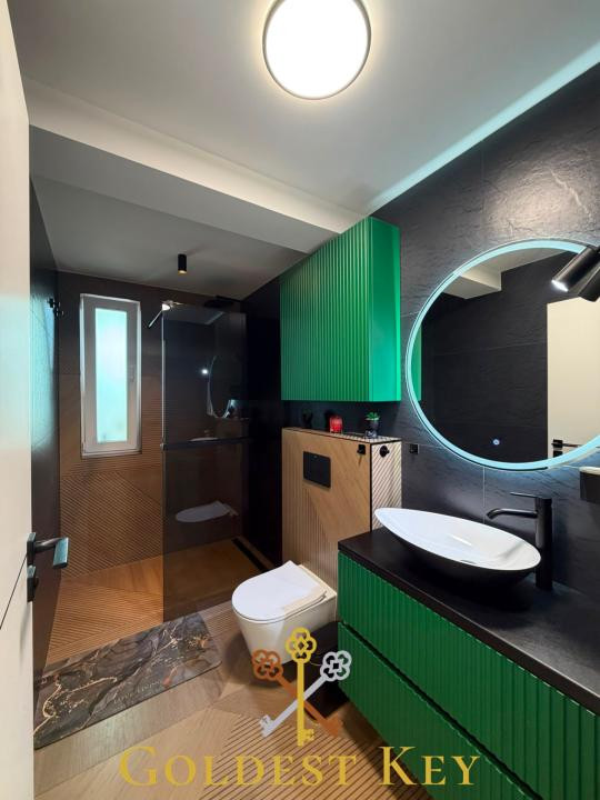 Apartament calitativ cu 3 camere, 2 băi, balcon, 2 garaje