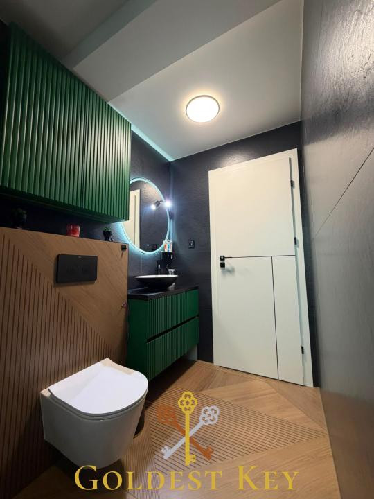Apartament calitativ cu 3 camere, 2 băi, balcon, 2 garaje