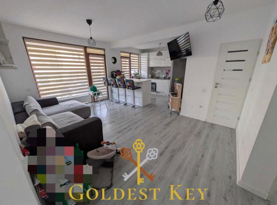 Apartament cu 4 camere, terasă, curte si 2 parcări la intrare în Baciu