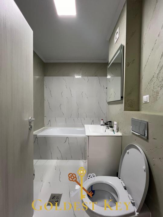 Apartament modern cu 2 camere semidecomandate, balcon și parcare! 