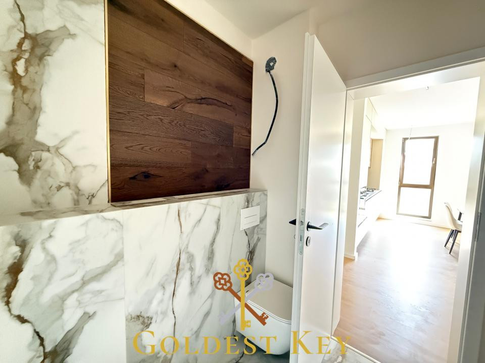 Apartament NOU cu 2 camere, balcon și parcare subterană 